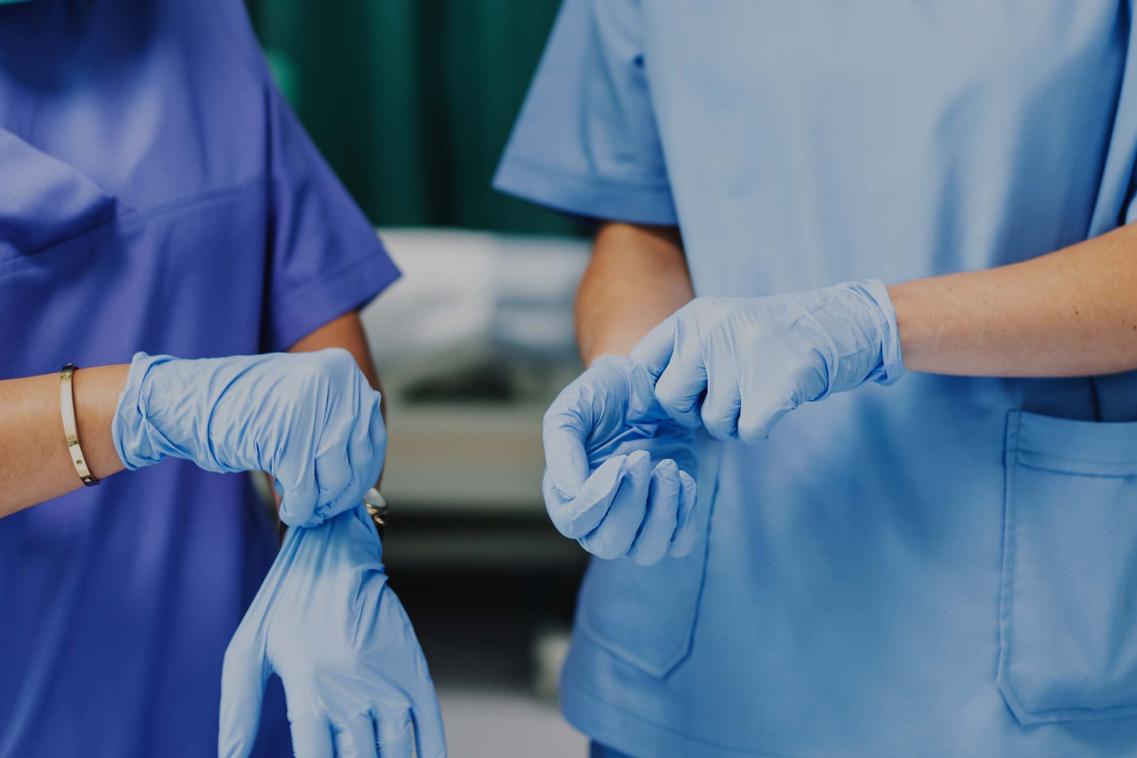 NHS workers in scrubs