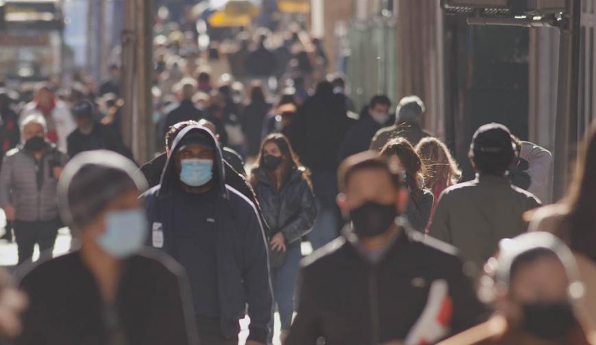 People in masks on high street