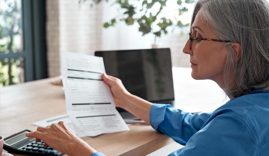 Woman calculating pensions