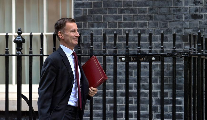 Jeremy Hunt walking along Downing Street