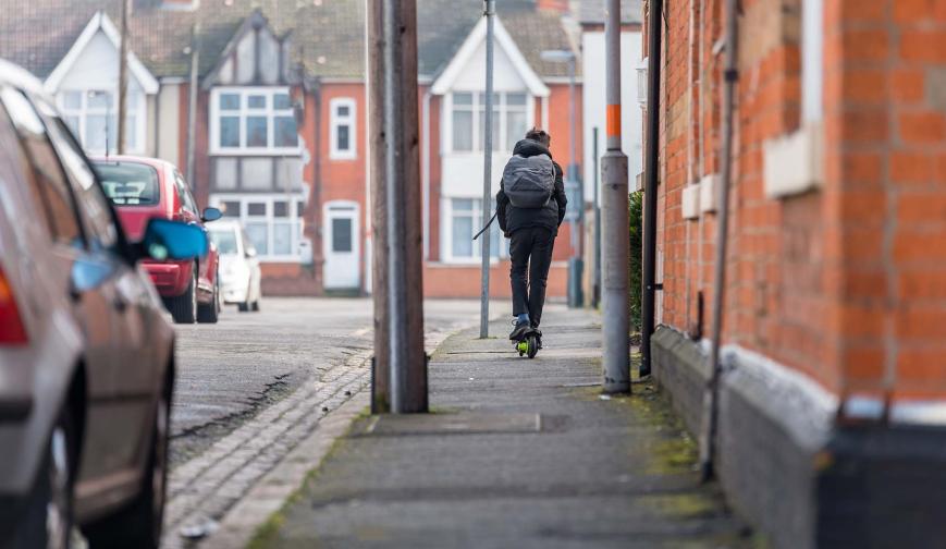 Teenager on scooter