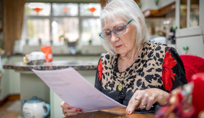Older woman at kitchen table