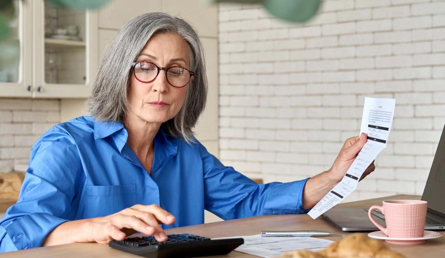 Senior lady doing calculations