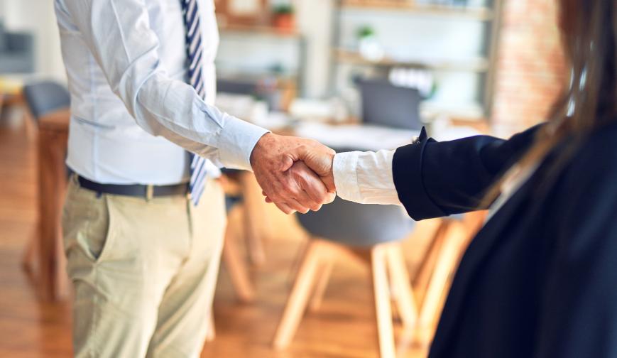 Handshake between two people