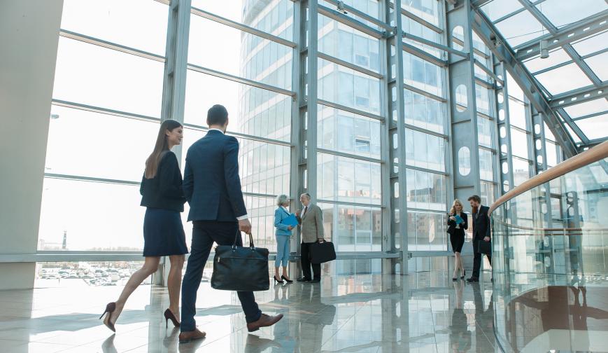 People walking in corporate building