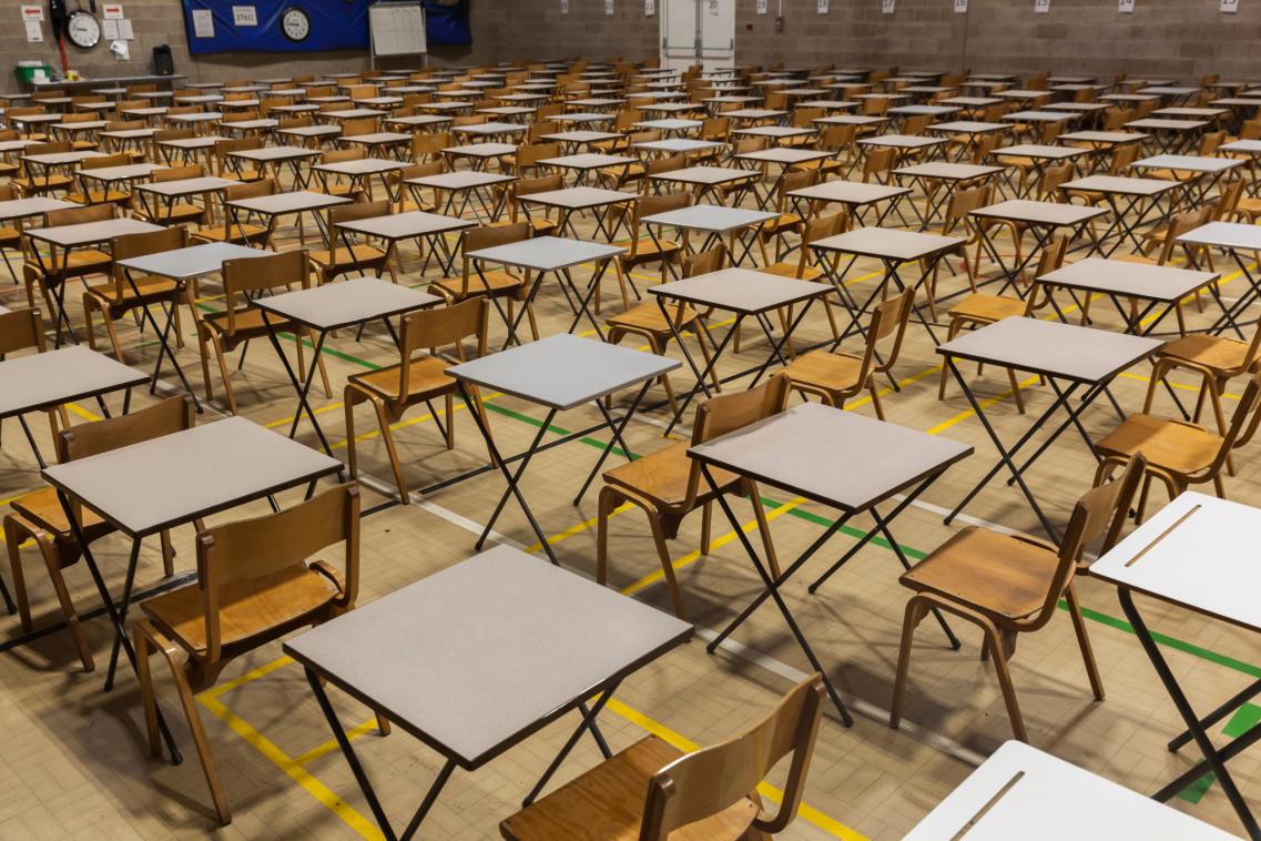 An image of desks set up for an exam