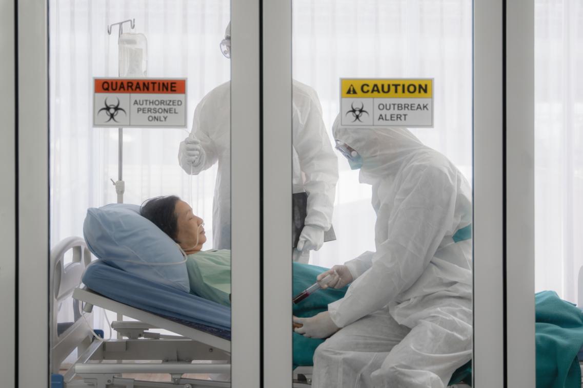 An image of a woman in a hospital bed