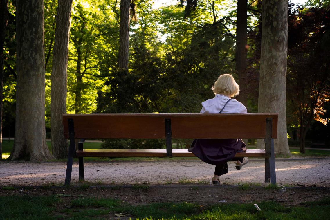 Older woman on a bench
