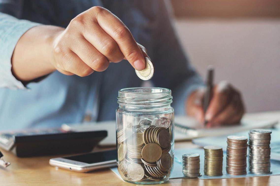 Jar with coins in