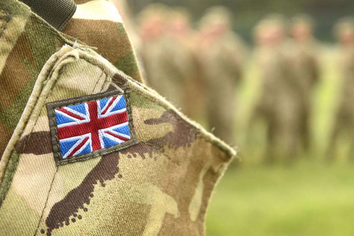 Soldier with UK flag on clothes