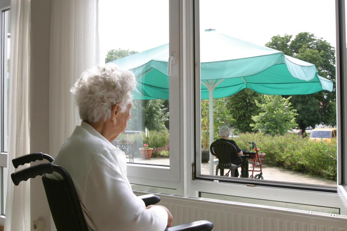 An elderly couple in a care home
