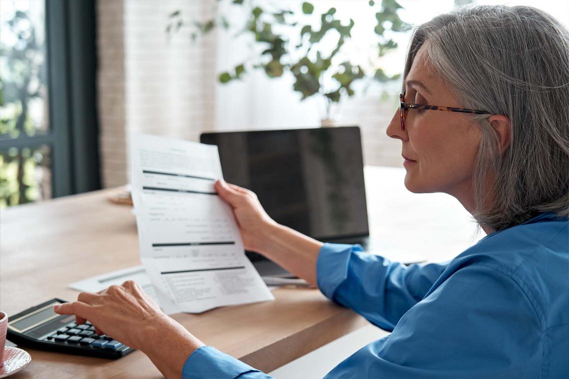 Woman calculating pensions