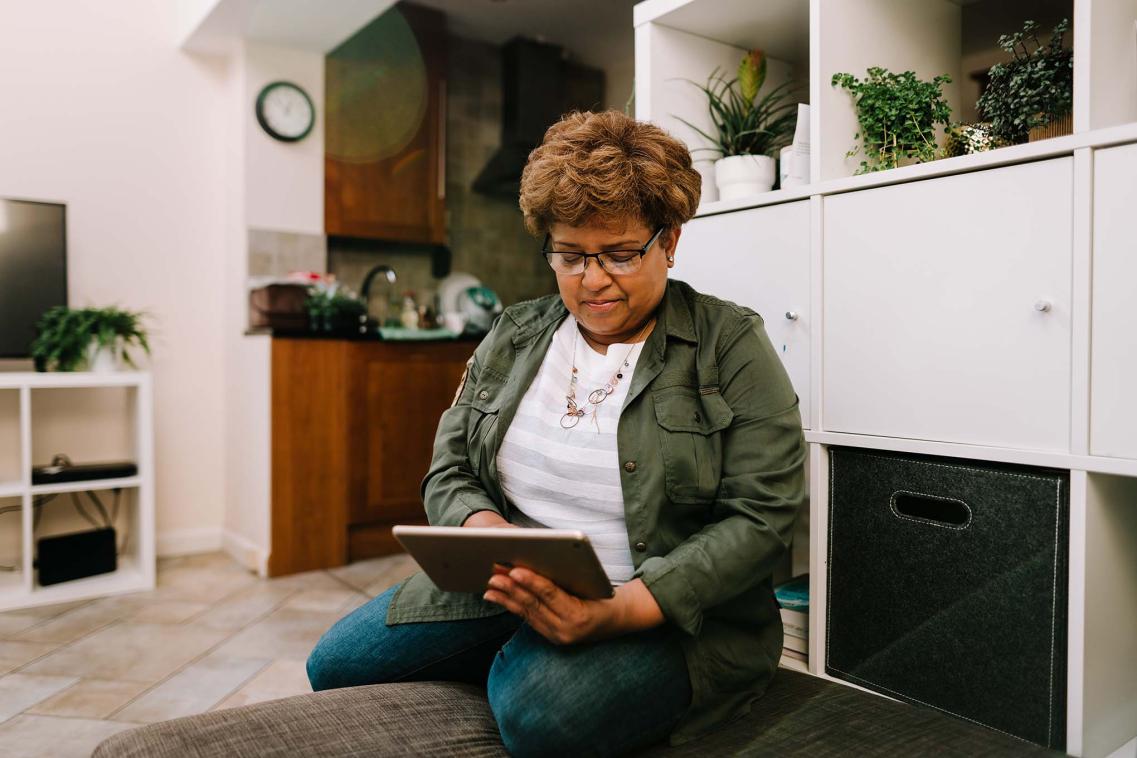 Older woman using iPad