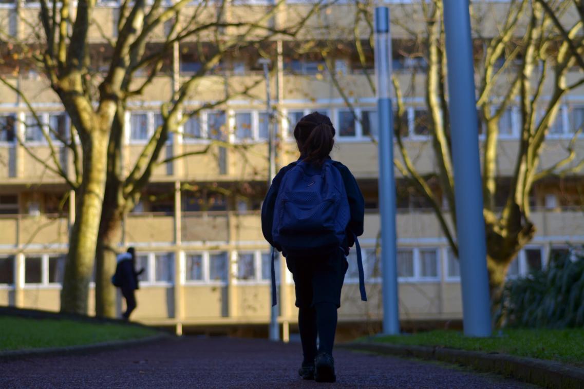 A photo of a child walking