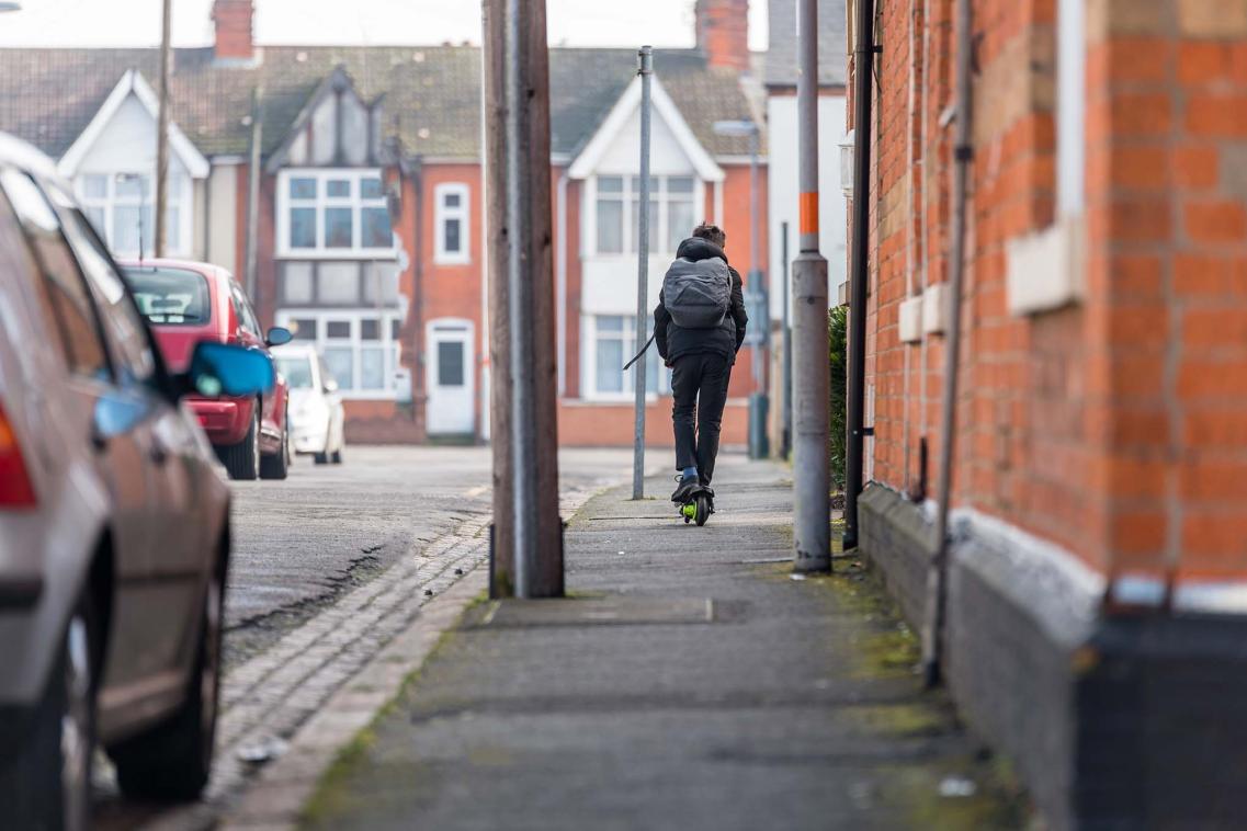 Teenager on scooter