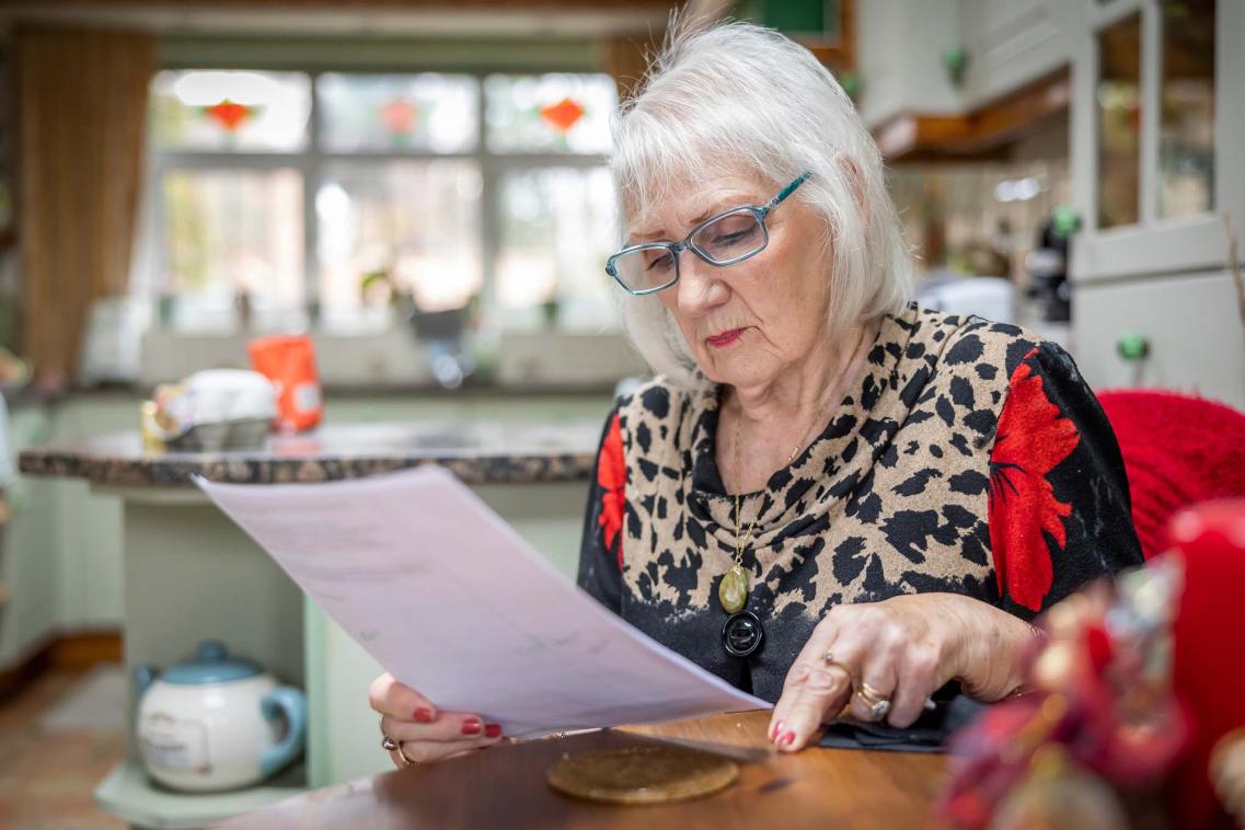Older woman at kitchen table