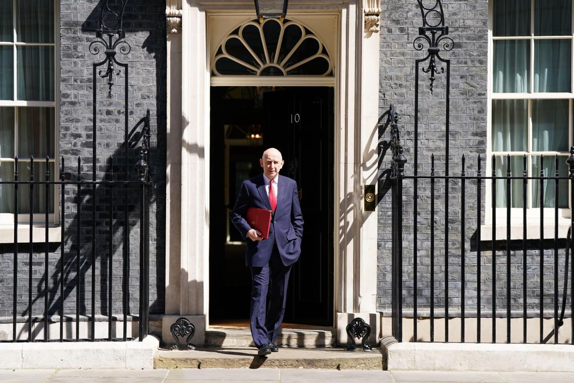 Image of Chancellor John Healey standing in front of Downing street 