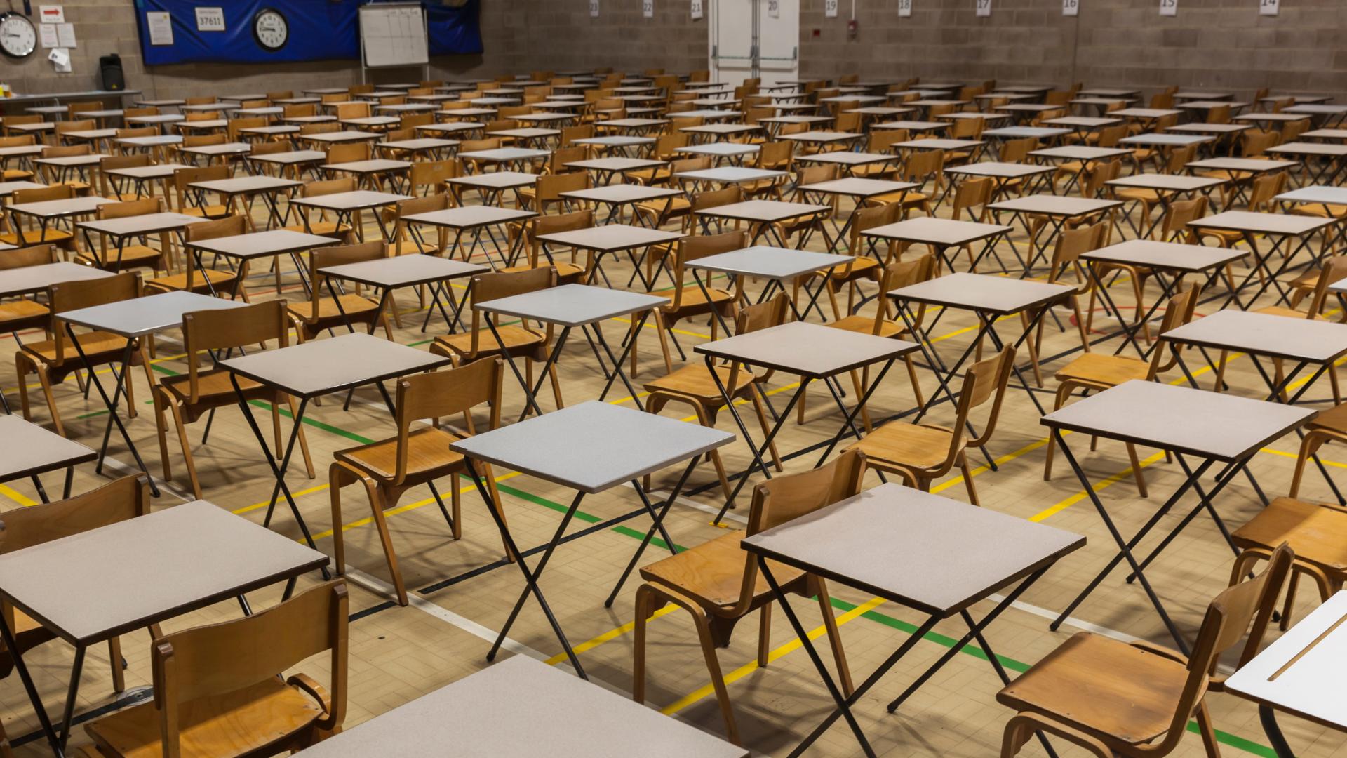 An image of desks set up for an exam