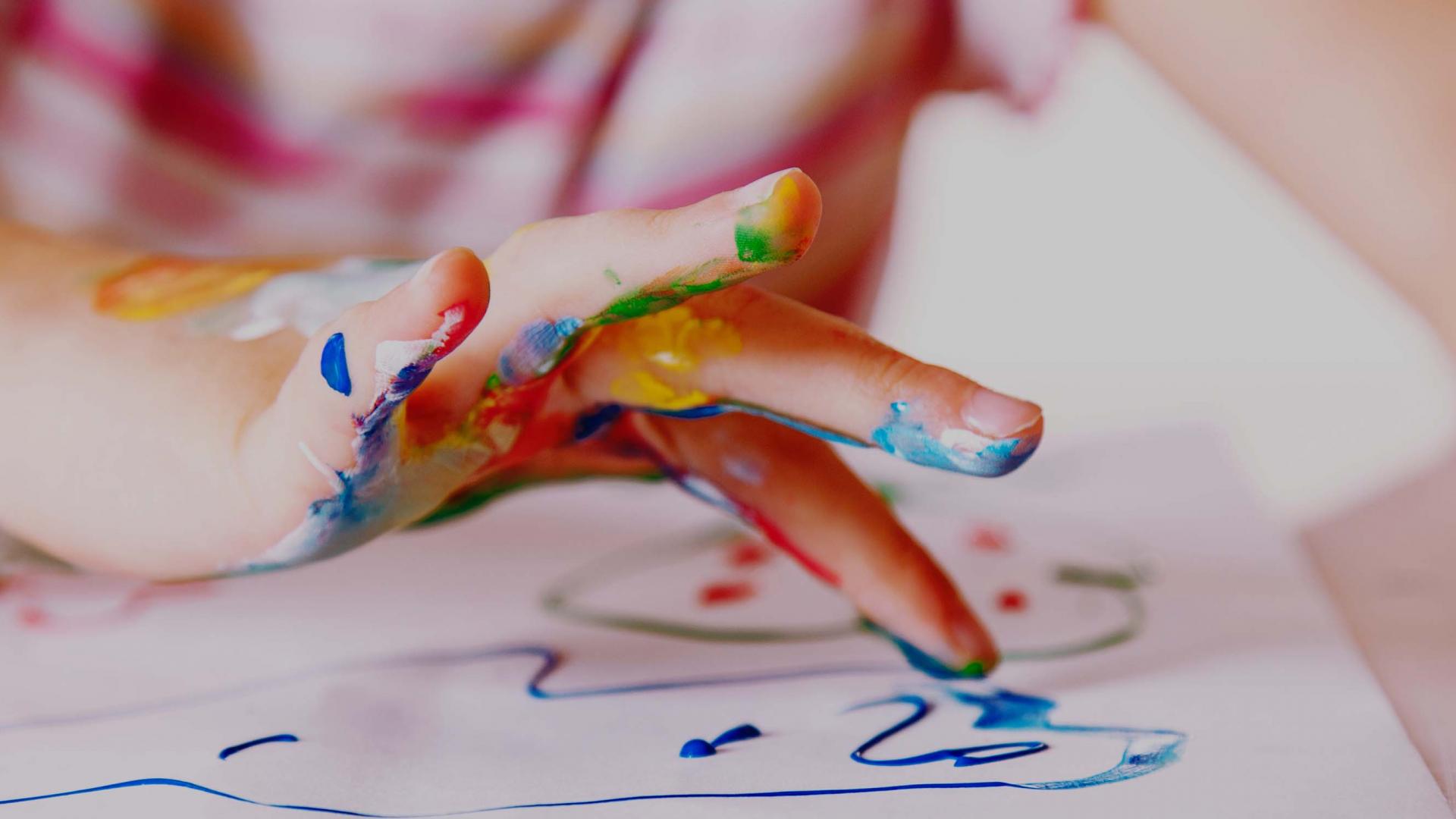 Child playing with paint
