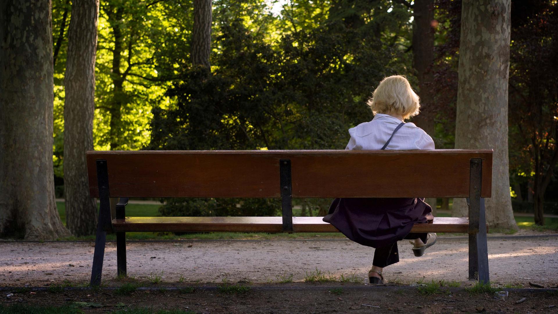 Older woman on a bench