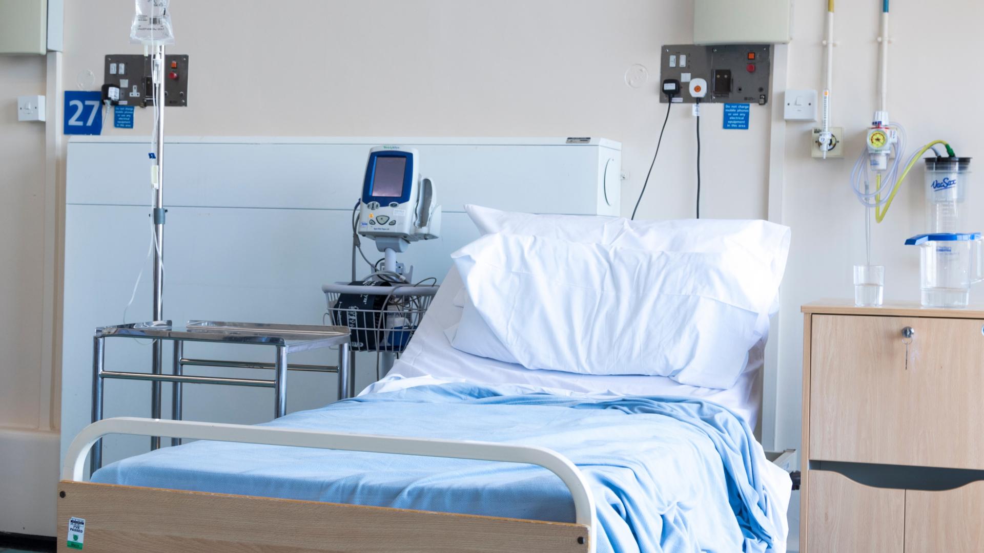 An image of an empty hospital bed