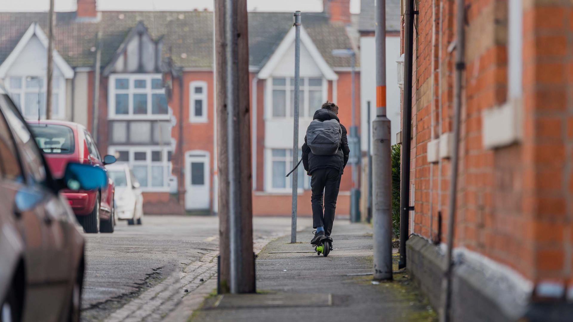 Teenager on scooter