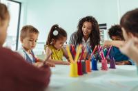 An image of children drawing
