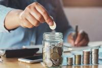 Jar with coins in