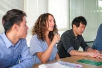 Staff and students meeting in the office