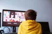 child attending class via video call