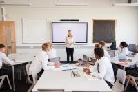 Teacher presenting to class