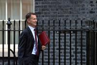 Jeremy Hunt walking along Downing Street