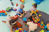 Children playing with bricks in a sure start centre