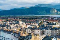 Welsh town with mountains behind