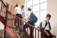 pupils on a staircase in school