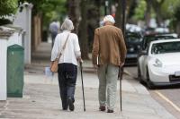 A photo of an older couple walking