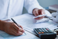 Man calculating tax