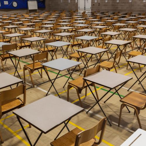 An image of desks set up for an exam