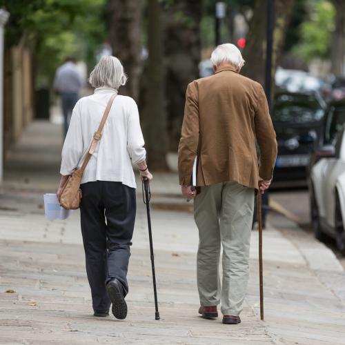 A photo of an older couple walking