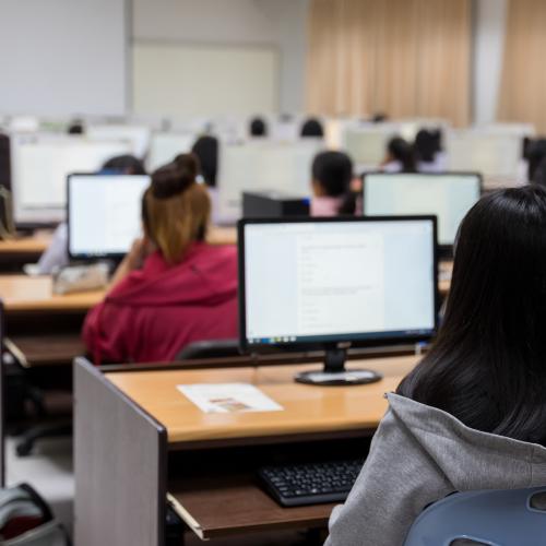 Image of students seated in a computer lab