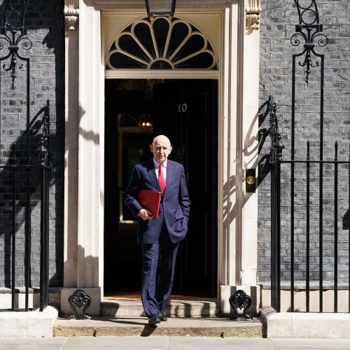 Image of Chancellor John Healey standing in front of Downing street 