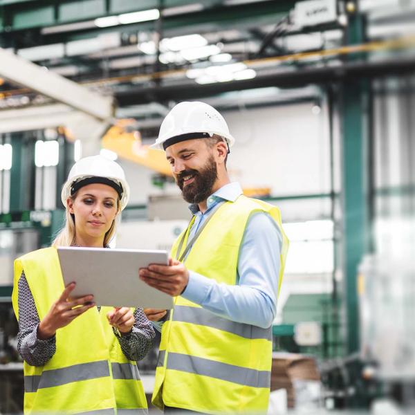 People at work in factory