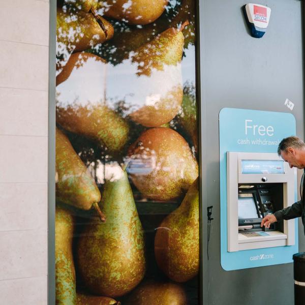 Man withdraws money from ATM