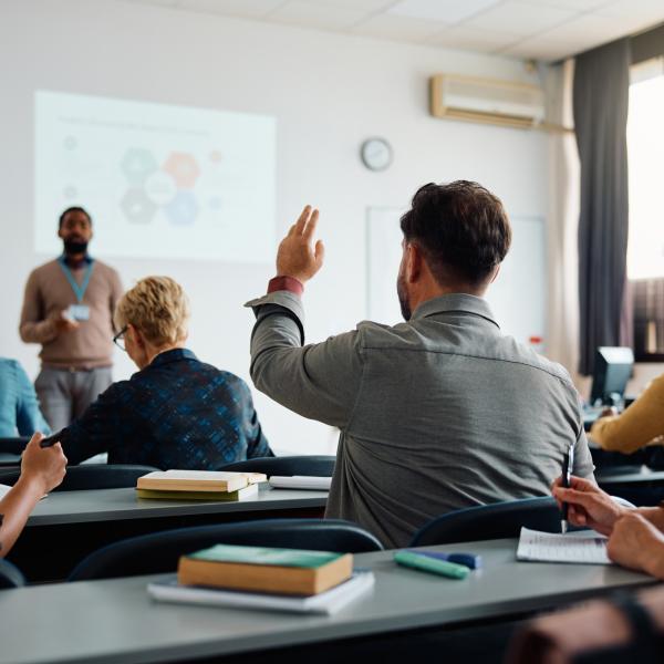 A photo of adults in a classroom