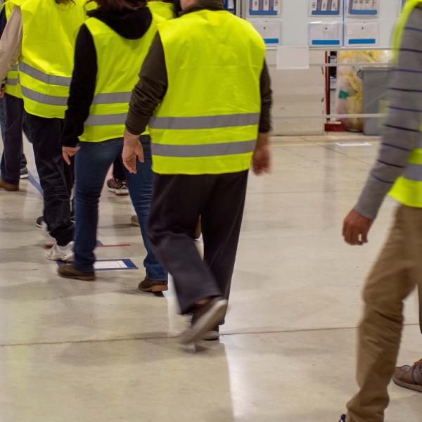 Warehouse workers walking