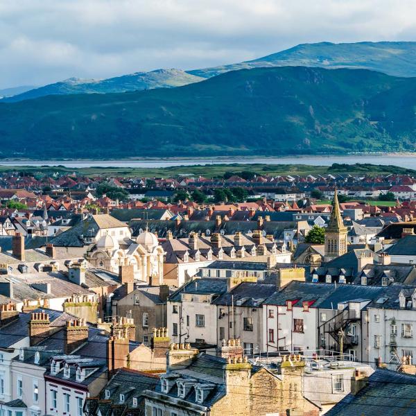 Welsh town with mountains behind