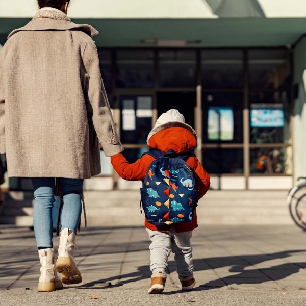 Child and mother holding hands